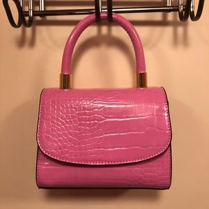 Pink Aldo Mini top handle purse